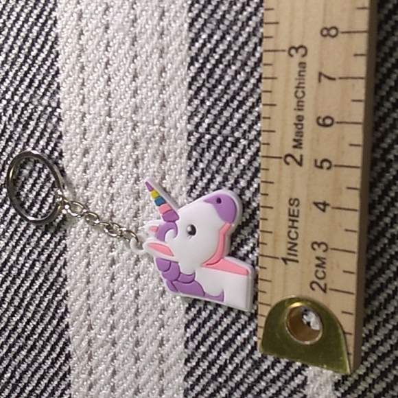 8 Unicorn Keychain's cute for any occasion. White, pink, purple, yellow - Picture 10 of 15